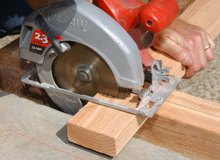 cutting wood in line with circular saw