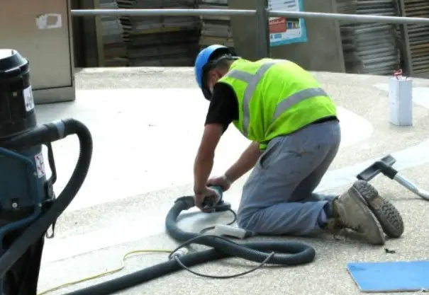 safety when grinding concrete by angle grinder