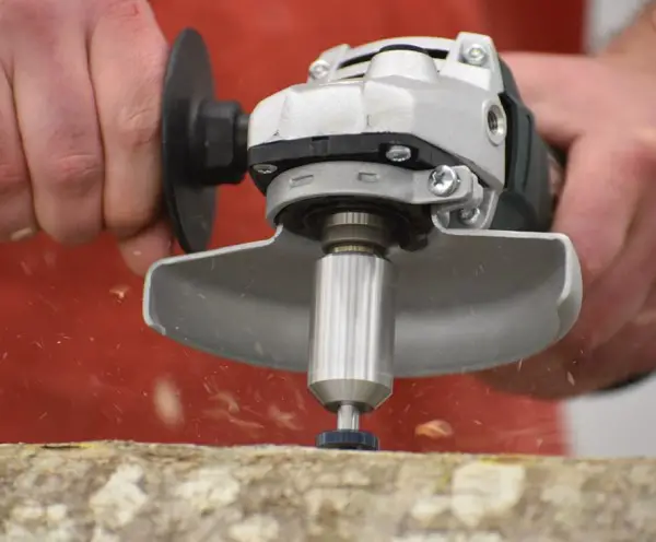 Angle grinder adapter for mushroom log inoculation