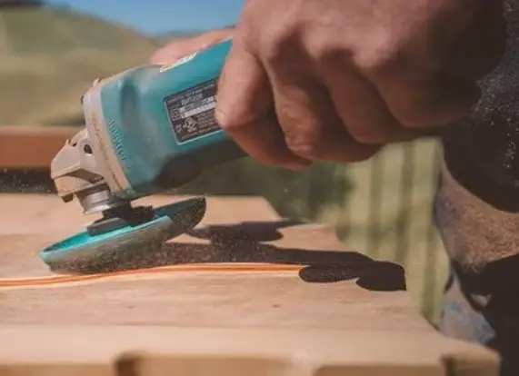 use a small angle grinder for wood carving